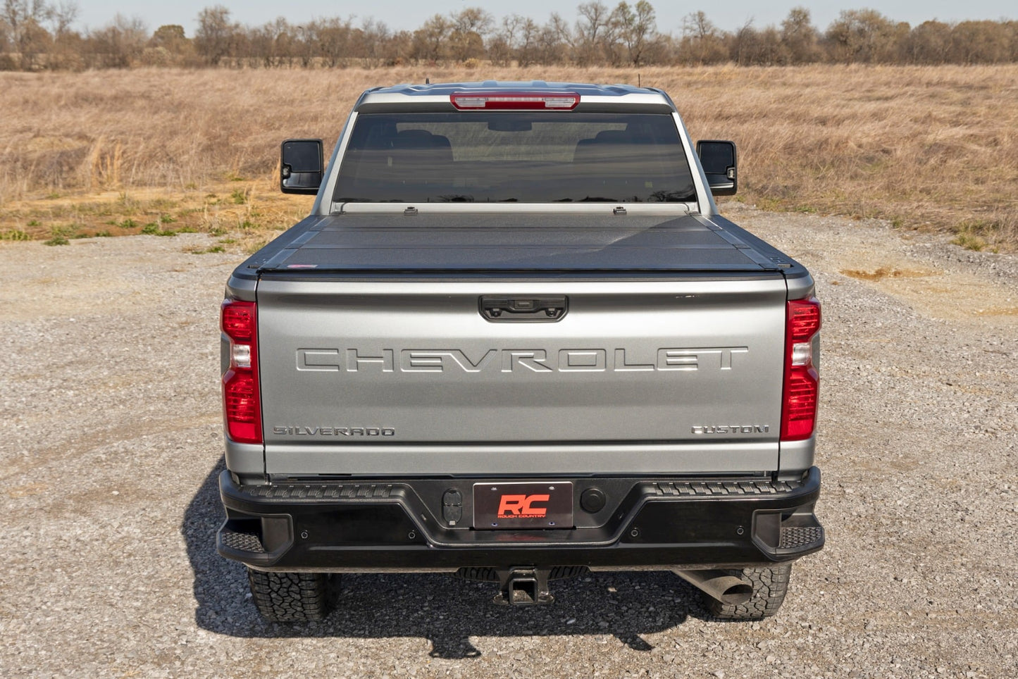 Hard Tri-Fold Flip Up Bed Cover | 6'9" Bed | Chevy/GMC Silverado/Sierra 2500HD/3500HD (20-26)